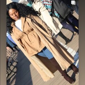 Both the trench coat and poncho.